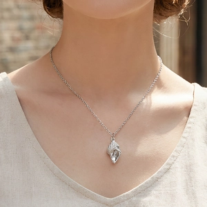 Exquisite silver spiral conch shell pendant necklace with a minimalist link chain for women