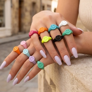 Colorful smiley face heart rings in vibrant macaron candy colors for a trendy summer look