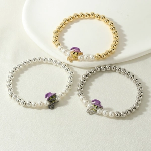 Three-piece Halloween elastic beaded bracelet set with cute witch cat charms and pearls