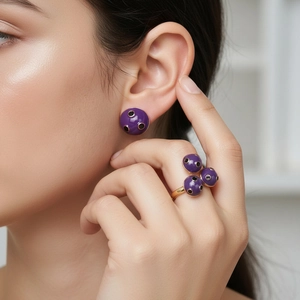 Polka dot purple enamel jewelry set with earrings and ring on model with gold finish