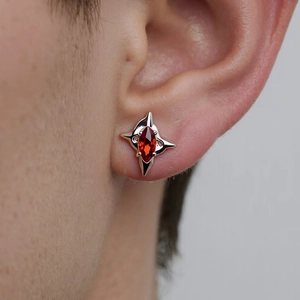 Gothic star stud earring with marquise cut red zircon stone in silver metal