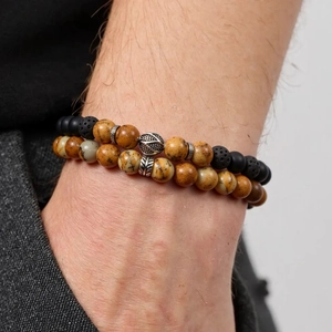 Details von Perlenarmband mit Türkis, schwarzem Lavastein und silbernem Metallblatt