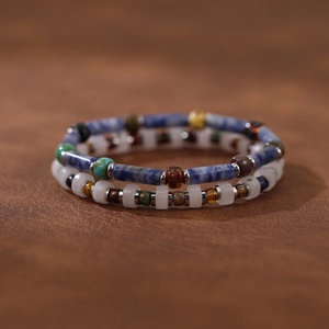 Detail of bohemian handmade beaded bracelets with natural stones and Czech glass beads