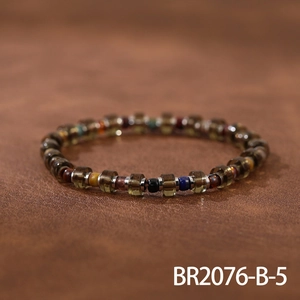 Detailed view of handmade beaded bracelet with bohemian stones and vintage Czech glass beads