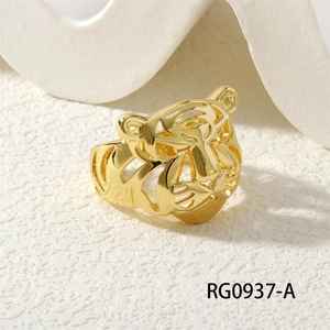 Detailed close-up of a hollow tiger head ring in gold finish with vintage design