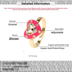 Detail of gold-plated heart ring with pink enamel and evil eye zircon inlay dimensions