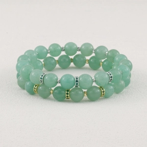 Detailed view of double layer green aventurine beaded bracelet, elegant gemstone jewelry item.