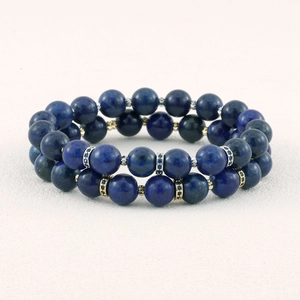 Double layer natural blue stone beaded bracelet close-up detail, fashion luxury jewelry for women.