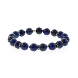 Elegant lapis lazuli beaded bracelet with gold spacer beads, stylish stretch jewelry for daily wear.