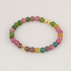 Multicolor natural stone beaded bracelet with gold metal accents and red inlay detail