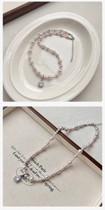 Detail of pink pearl necklace with square crystal pendant and adjustable extension chain