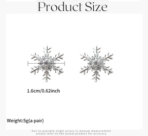 Detalle de pendientes de copo de nieve de 1,6 cm con circonitas y acabado plateado