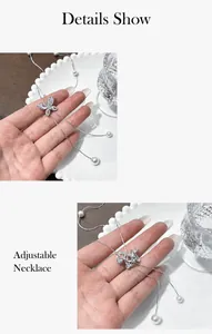 Makroaufnahme der silbernen Schmetterlingskette mit Zirkonia und verstellbarer Perle