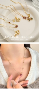 Detailed view of enamel puppy pendants with pearls and cubic zirconia necklace strands