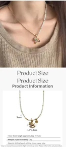 Detail of half-pearl and gold chain necklace with colorful zircon horse pendant charm
