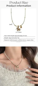 Detail view of rocking horse pendant with pearls and dimensions 1.7x1.4cm on a necklace