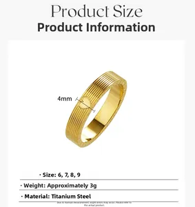 Detail view of 4mm gold titanium steel ring with numbered engraving and heart detail