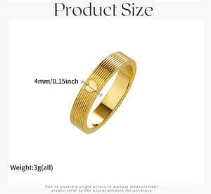 Detail of 4mm gold titanium steel ring featuring engraved numbers and heart pattern