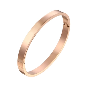 Polished rose gold titanium steel oval clasp bracelet with minimalist brushed metal finish