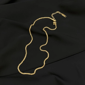 Elegant gold titanium steel choker necklace with a sparkling textured chain for women