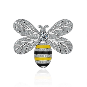 Elegant bee brooch with sparkling zircon wings and yellow black enamel body on white background