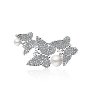 Elegant silver butterfly brooch with sparkling zircon inlay and two white pearls