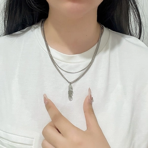 Double-layer titanium steel necklace with feather pendant and polished silver chain for men and women