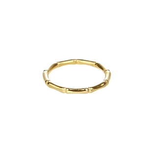 Minimalist golden titanium steel bamboo style ring with a polished glossy finish