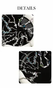 Macro detail of liquid metal necklace featuring vacuum plating and colorful gemstone accents