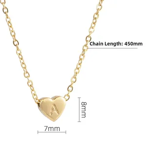 Detailed view of 18K gold heart pendant necklace with letter A engraving and 450mm chain
