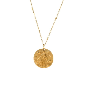 Collier médaille zodiaque doré vintage avec motif étoilé sur une chaîne à billes