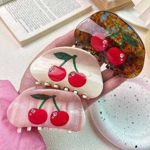 Three-piece set of large cherry claw clips with sparkling rhinestones in assorted colors
