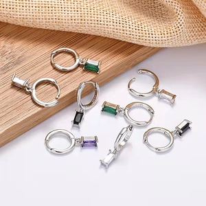 Macro view of 925 silver earrings with baguette-cut colorful zircon and S925 hallmark