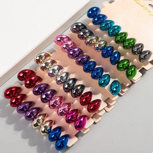 Minimalist metal water drop earrings in various metallic plating colors on display card