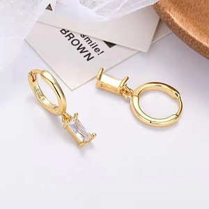 Detail showing S925 hallmark on gold plated hoop earrings with rectangle zircon drop