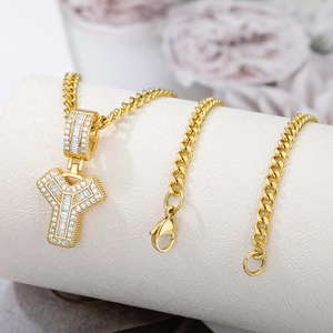 Gold-plated Cuban link chain with an iced out capital letter Y pendant and baguette stones