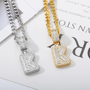 Iced out K letter pendants in gold and silver finish with crystal cuban chains