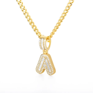 Golden uppercase letter A pendant necklace with sparkling cubic zirconia and Cuban link chain