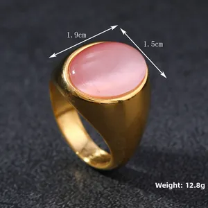 Macro detail of oval pink cat's eye stone ring with weight and size specifications