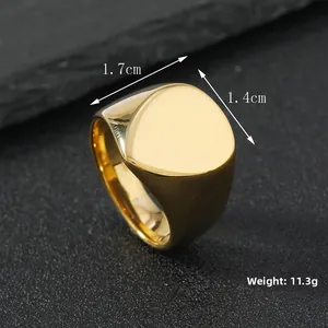 Macro shot of gold stainless steel signet ring with size and weight specs on stone