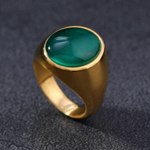 Vintage gold stainless steel ring featuring a large oval green cat-eye gemstone inlay