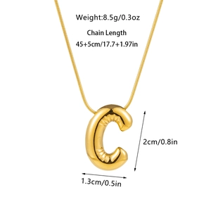 Macro detail of golden bubble letter C pendant with snake chain and product dimensions