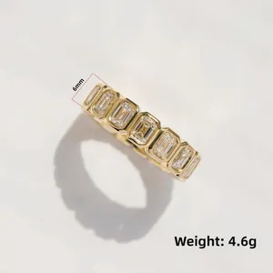 Detail shot of a 6mm gold plated band with emerald cut zircons and 4.6g weight