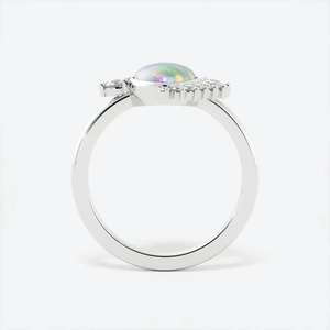 Elegant water drop colorful opal ring with diamond accents on a silver band