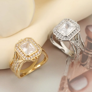 Elegant emerald cut moissanite ring with halo setting in gold and silver finish