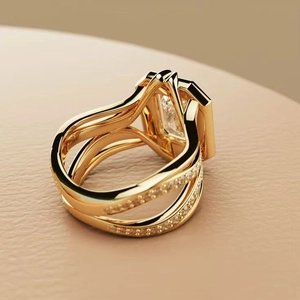Detailed macro view of emerald-cut crystal gold rings with crisscross bands