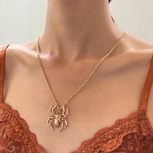 Golden 3D spider pendant necklace featuring a gothic punk style on a delicate chain