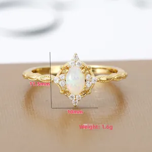 Vintage gold ring with oval white opal and tiny diamonds on twisted band measurement