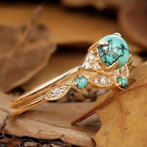 Bohemian gold ring with natural turquoise stone and vintage vine leaf design motifs