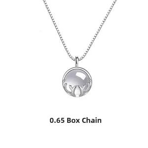 Elegant silver box chain necklace with deer antler pendant and round chalcedony stone